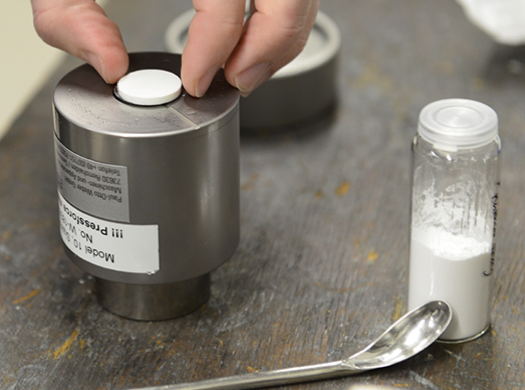 Geologically-inspired Strong Bulk Ceramics Made with Water at Room Temperature